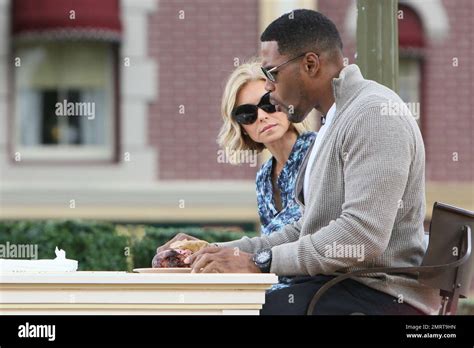 Kelly Rippa And Michael Strahan Shoot Their Show At Disneyland Los