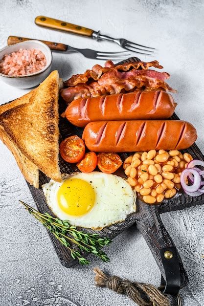 Premium Photo Full Fry Up English Breakfastt With Fried Eggs