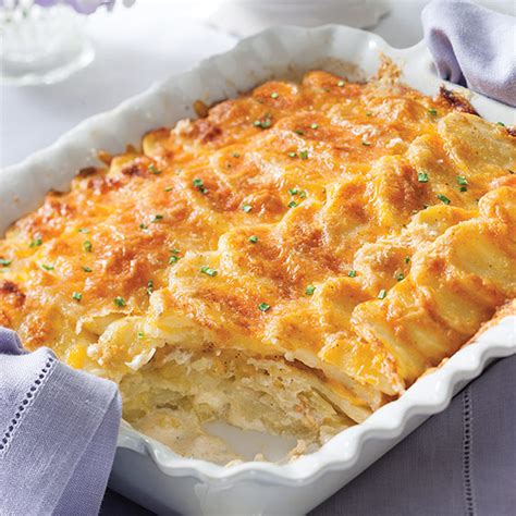 Spread out the potatoes in the bottom of the ready baking frying pan. Cheesy Scalloped Potatoes - Paula Deen Magazine