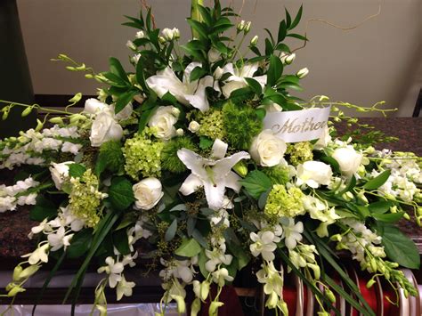 Find a beautiful casket spray for women or man. Green and white casket spray | Funeral flowers, Funeral ...