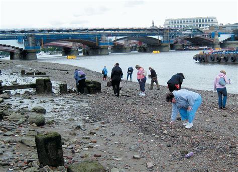 Mudlarking On The Thames In Hunt Of Treasures In London