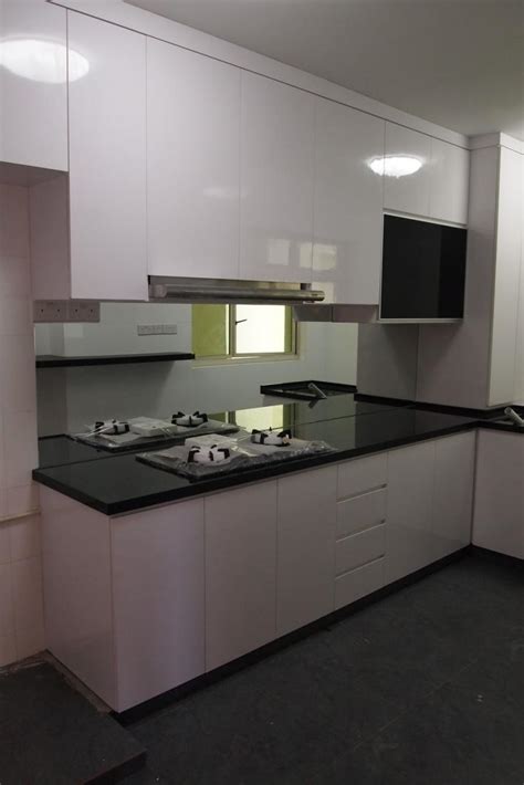 Love how this kitchen renovation creates an open feel for our clients to their dining room and office and a better transition to back yard! Kitchen cabinet design singapore photo gallery
