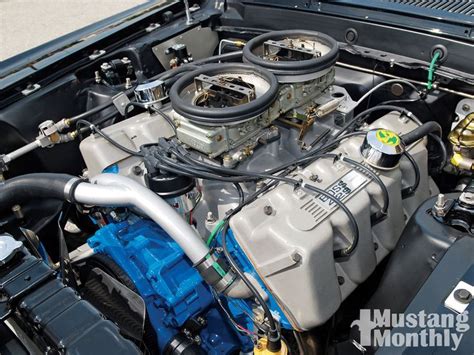 Fords Boss 429 Engine With Dual Quad 2 4bbl Carburetors Provides A