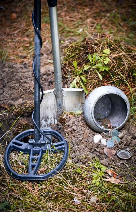 Search For Treasure Using A Metal Detector And Shovel Stock Image