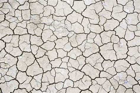 Texture Of Dry Cracked Soil Stock Photo By ©evok20 5176774