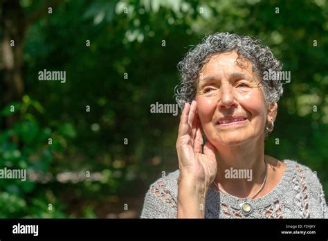 Senior Woman Hand Face Hi Res Stock Photography And Images Alamy