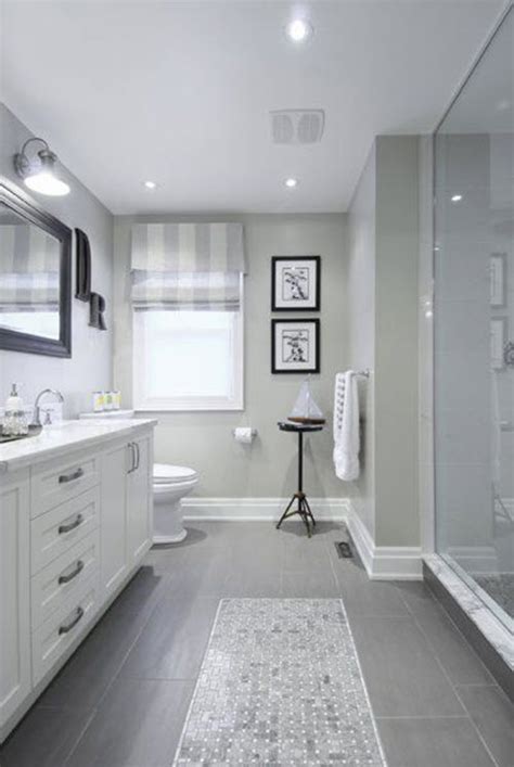 So if you're looking for white and gray bathroom ideas, consider going for gray bathroom walls with white crown molding. 38 gray bathroom floor tile ideas and pictures