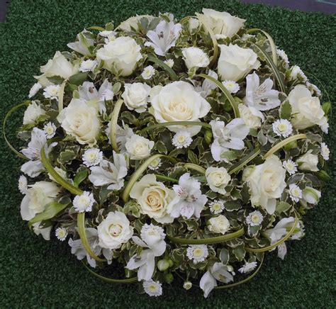Good flower designers know what's in season and what flowers be open to your florist's suggestions. Funeral Posy pad on a tight budget | Funeral flowers ...
