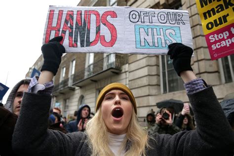 thousands march on downing street to protest nhs funding cuts