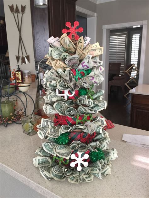 Tantalizing packaging for money gifts with these money gift ideas, it's all about some unique, showy presentation. $500 money tree for Christmas gift | Holiday decor, Christmas wreaths, Hobby gifts