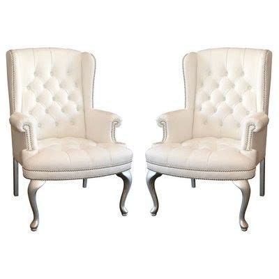 Service was great, with the table actually arriving a couple of weeks earlier than promised. White wing-back chairs for the ends of the dining room ...
