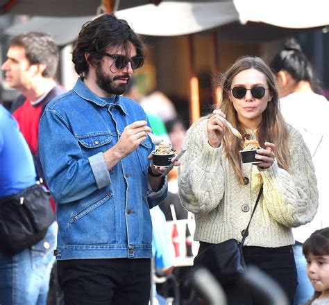 Elizabeth olsen sparks marriage speculation after calling robbie arnett her 'husband.' watch it. Elizabeth Olsen and her boyfriend Robbie Arnett out in Los ...