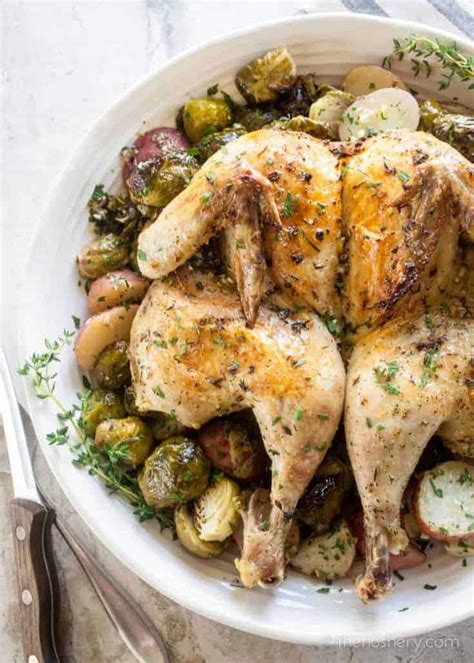 No matter how you serve it, roast chicken doesn't need a lot to turn it into a meal — a simple side or two will do. Lemon Garlic Spatchcock Chicken Dinner | The Noshery