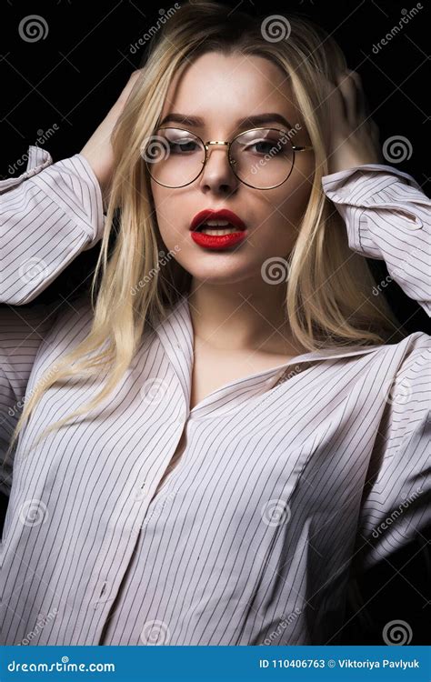 Luxurious Blonde Woman In Glasses Wearing Blouse With Naked Shoulders