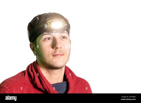 Hiker Man With Head Lamp Flashlight With Light Beam Isolated On White