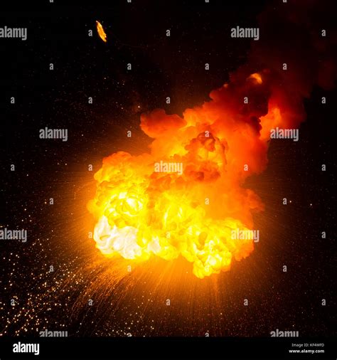 Realistic Fire Explosion Orange Color And Sparks Isolated On Black