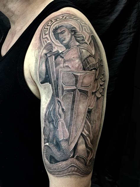 St.michael statue done by Jon Koon at Artistic studio hair and tattoo
