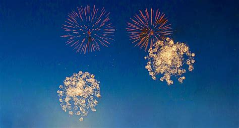 Four Beautiful Fireworks In Night Skyfireworks Background 7953793