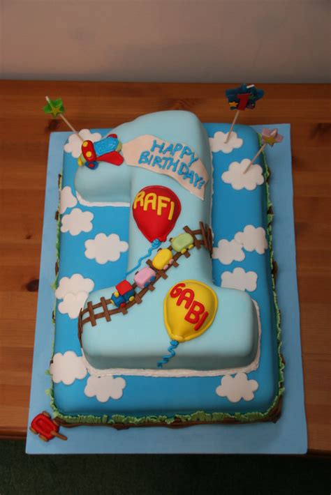 A perfect birthday cake for a boy who is 3 years old. Rafi & Gabi 1st Birthday Cake | This cake was created for ...