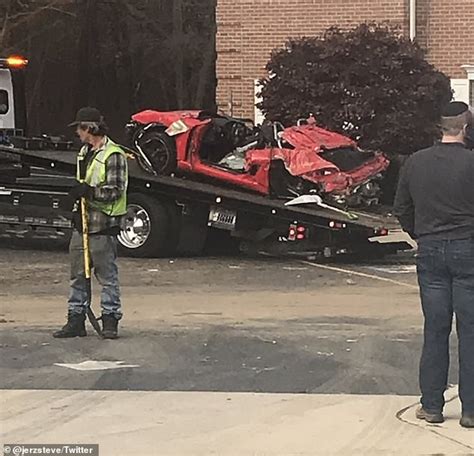 Two People Are Killed When A Red Porsche Crashes Into Second Story Of