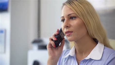 Secretary Answering Phone Call And Talking To Clients In Office Business Stock Image Image Of