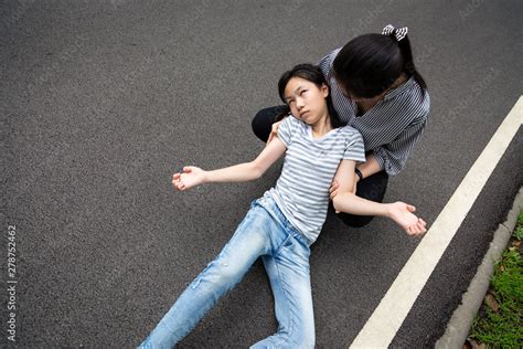 Sick Child Girl With Epileptic Seizures On Streetdaughter Suffering