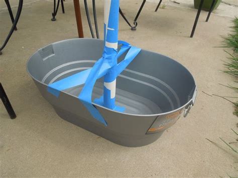 Optimal umbrella stand, or umbrella base, weights depend on the size of your umbrella. Easy, Illustrated Instructions on How to Make a Concrete Patio Umbrella Stand | Outdoor umbrella ...
