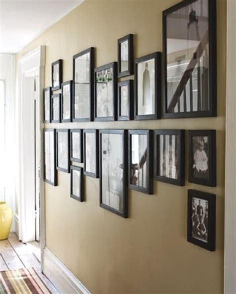 A Wall With Many Framed Pictures On It