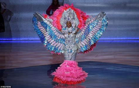 maria teresa cortez of nicaragua donned an eye catching silver and pink costume which feat