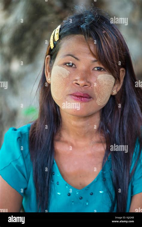 Portrait Of Burmese Girl With Thanaka On Face On Mandalay Myanmar Stock