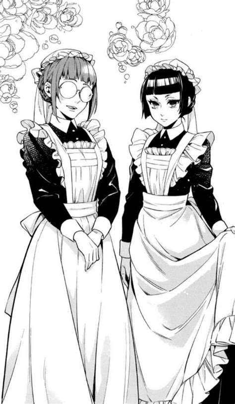 Two People Dressed Up In Maid Outfits