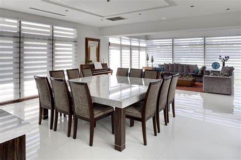 Chandelier lighting illuminates more evenly and improves the aesthetics of the room. 23 Designs for Epically Large Dining Rooms - Page 4 of 5
