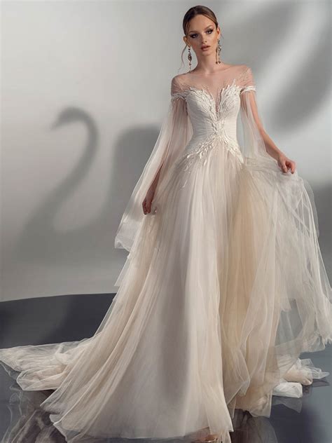 A Line Wedding Dresses With Sleeves Top Find The Perfect Venue For