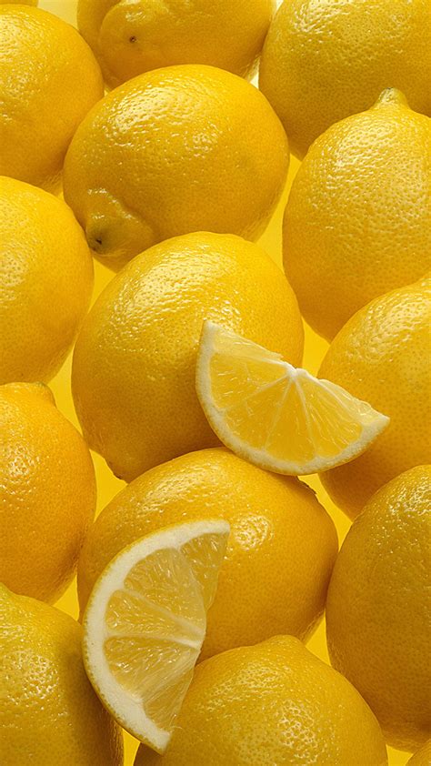 Update walls in just minutes with peel and stick wallpaper: Wallpaper Texture Yellow Lemons Food Many 1080x1920