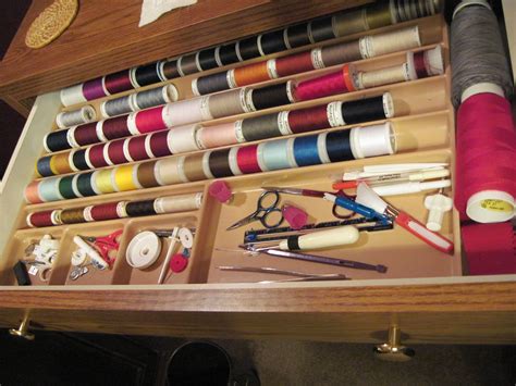 Sewing machine cabinets provide you with a dedicated workspace as well as a way to keep notions and supplies organized and easily available. Horn Sewing Cabinet Drawer | My sewing room, Sewing ...