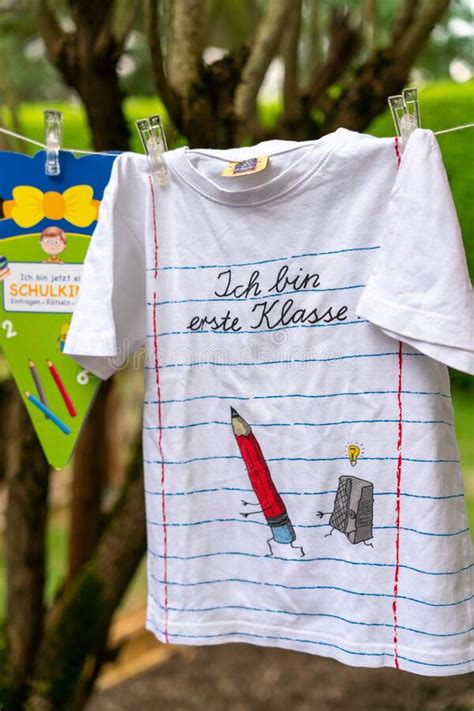 Vertical Shot Of A Cute German First Grader School Shirt On A Laundry