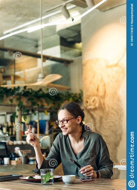 Portrait Of Businesswoman Having Lunch In A Cafe Young Female