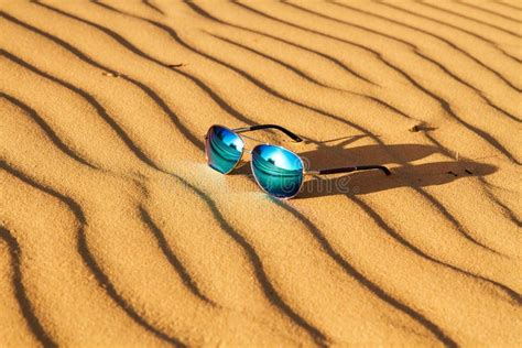 Sunglasses On The Sand In The Desert Stock Image Image Of Reflection