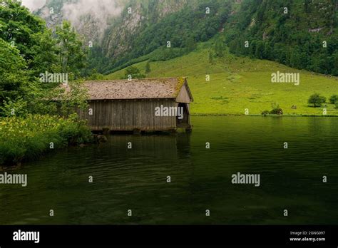 Wooden Boathouse At The Beautiful Obersee And Konigssee Lake In