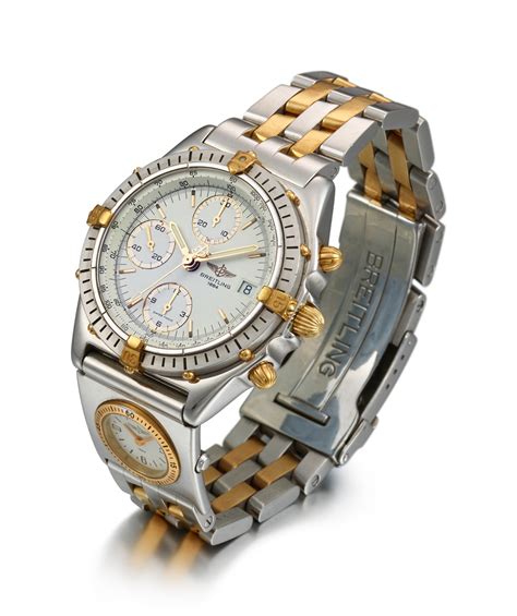Breitling A Stainless Steel And Yellow Gold Dual Time Zone
