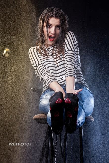 wetlook by pretty girl in striped sweater high waisted jeans and red high heels