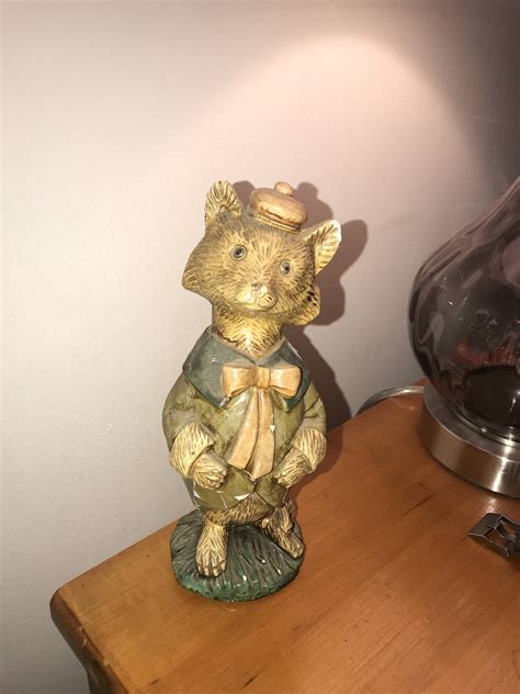 Small yard decorations make a difference in garden design. Old Fox Statue? : whatisthisthing