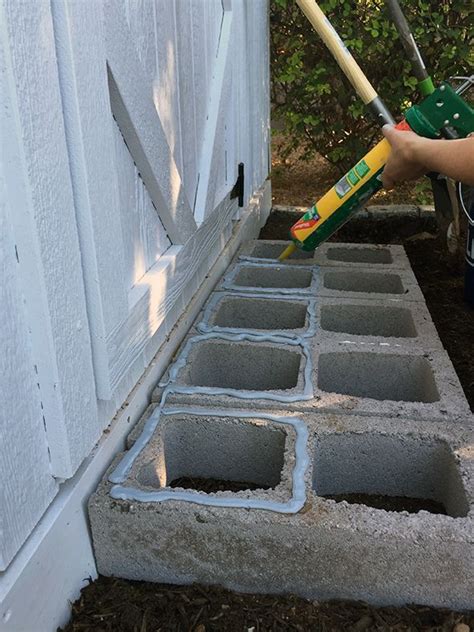 I used cement glue to attach the pavers to the cinder block. | Backyard