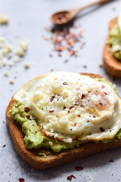 Avocado toast with spicy mayo and shichimi togarashi. Spicy Avocado Toast with Egg - Isabel Eats
