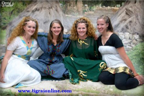 Beautiful White Women In Traditional Ethiopian Hairdo And Dresses