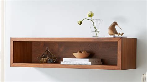 There really can't have been that many people who haven't been faced with one at least once, although for most of us, the frustration of the underlying. Aspect Walnut 47.5" Floating Cube Shelf | Crate and Barrel