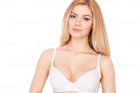 Pure Beauty Portrait Of Beautiful Young Blond Hair Woman In White Bra Looking At Camera While