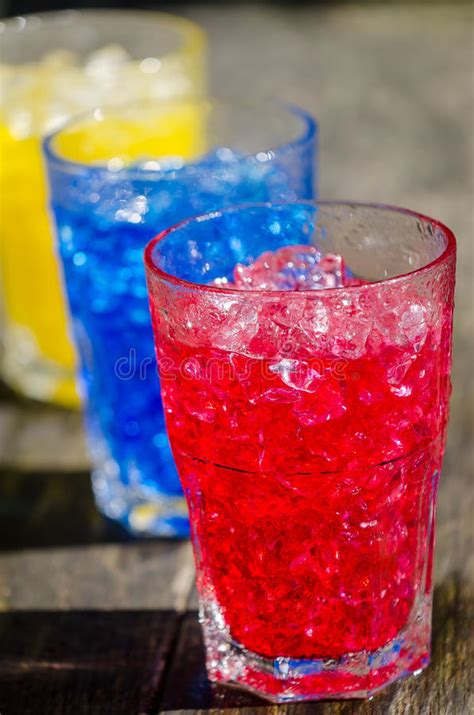 13 ornamental reds and yellows. Red Blue And Yellow Cocktails Stock Photo - Image of ...