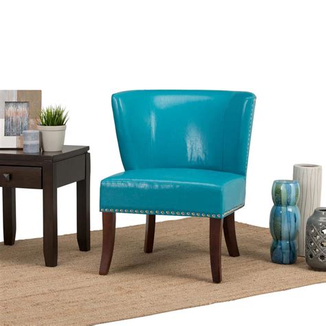 An armchair is a wonderful piece to have in your living room, family room or bedroom. Simpli Home Jamestown Mediterranean Blue Bonded Leather ...