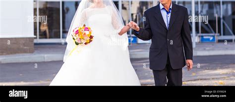 Father Is Taking His Young Daughter To The Altar Stock Photo Alamy